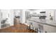 Open kitchen features granite countertops, stainless steel appliances, and counter seating at 2299 Brenda Se Dr, Smyrna, GA 30080