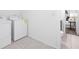 Laundry room featuring white washer and dryer at 2299 Brenda Se Dr, Smyrna, GA 30080