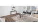 Bright living room features modern decor, stylish furnishings, and lots of natural light at 2299 Brenda Se Dr, Smyrna, GA 30080