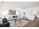 Inviting living room features stylish decor, neutral tones and lots of light at 2299 Brenda Se Dr, Smyrna, GA 30080