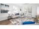 Bright living room featuring neutral furniture, modern accents, and plenty of natural light at 2299 Brenda Se Dr, Smyrna, GA 30080