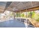 Relaxing screened patio with ceiling fan overlooking the backyard and deck at 2299 Brenda Se Dr, Smyrna, GA 30080