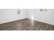 Room showcasing the warm laminate wood flooring at 2299 Brenda Se Dr, Smyrna, GA 30080
