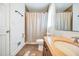 Bathroom featuring a sink with a wood vanity, large mirror and a shower/tub combination at 3281 Old Salem Rd, Conyers, GA 30013