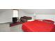 A cozy bedroom featuring a sloped ceiling, a desk, and comfortable furnishings at 3281 Old Salem Rd, Conyers, GA 30013