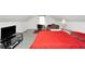 A cozy bedroom featuring a sloped ceiling, a desk, and comfortable furnishings at 3281 Old Salem Rd, Conyers, GA 30013