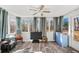 Comfortable sunroom with a view of the outdoors and stylish decor at 3281 Old Salem Rd, Conyers, GA 30013