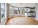 Sunlit dining area with a bay window and view into the kitchen at 845 James Path Ct, Lawrenceville, GA 30044