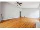 Large living area with hardwood floors and bright natural light at 845 James Path Ct, Lawrenceville, GA 30044