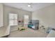Neutral bedroom featuring carpeted floor and natural light at 971 Thibideau Ct, Sandy Springs, GA 30328