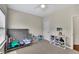 Bright, neutral bedroom with carpet, ceiling fan, and storage at 971 Thibideau Ct, Sandy Springs, GA 30328