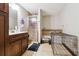 Bathroom featuring a vanity, shower, and pet kennel area at 270 Oak Ridge Rd, Covington, GA 30016