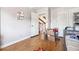 Bedroom with hardwood floors, closet, plus doorway to an adjacent room; needs decluttering at 270 Oak Ridge Rd, Covington, GA 30016