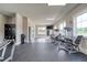 Spacious gym featuring modern exercise equipment, lockers, and ample natural light from large windows at 293 Depot Landing Rd, Auburn, GA 30011