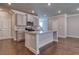 Stylish kitchen with a large center island, stainless steel appliances, and ample cabinet space at 293 Depot Landing Rd, Auburn, GA 30011