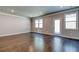 Spacious living room with hardwood floors, crown molding and access to the outdoors at 293 Depot Landing Rd, Auburn, GA 30011