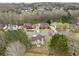 Aerial shot of a home and neighborhood near wooded areas at 3920 Cain Mill Dr, Lithonia, GA 30038