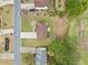 A high-angle aerial of the house showing its location in a neighborhood at 3920 Cain Mill Dr, Lithonia, GA 30038