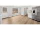 Kitchen with stainless appliances, white cabinets, and a view to the back yard at 3920 Cain Mill Dr, Lithonia, GA 30038