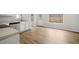 Bright kitchen with white cabinets, stainless steel dishwasher, and natural light at 3920 Cain Mill Dr, Lithonia, GA 30038
