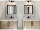 Double vanity bathroom with modern mirrors, stylish lighting, and ample counter space at 482 Majestic Oaks Pl, Smyrna, GA 30082