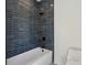 Modern bathroom showcases a stylish shower, tiled walls, and contemporary fixtures for a spa-like experience at 482 Majestic Oaks Pl, Smyrna, GA 30082