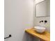 Bathroom with wooden countertop, bowl sink, matte black faucet and mirror at 482 Majestic Oaks Pl, Smyrna, GA 30082