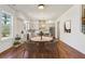 Bright breakfast nook near kitchen with modern cabinetry, stainless steel appliances, and hardwood floors at 482 Majestic Oaks Pl, Smyrna, GA 30082