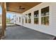 Covered patio with a stained ceiling, natural wood columns, and concrete flooring at 482 Majestic Oaks Pl, Smyrna, GA 30082