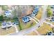 Aerial view of the property in a residential neighborhood highlighting mature trees and landscaping at 633 Windy Mill Xing, Temple, GA 30179