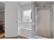 Relaxing bathroom with a soaking tub, separate shower, and mosaic tile accents at 633 Windy Mill Xing, Temple, GA 30179