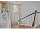 Grand two-story foyer with hardwood stairs and plenty of natural light at 633 Windy Mill Xing, Temple, GA 30179