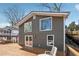 View of the back of a house from a wooden deck on a sunny day at 6337 Lake View Dr, Buford, GA 30518