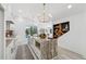 Modern kitchen with granite island, custom cabinets, and stylish decor at 6337 Lake View Dr, Buford, GA 30518