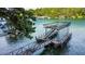 Beautiful dock with a sundeck and boat slips; the perfect place to relax and enjoy the lake at 6337 Lake View Dr, Buford, GA 30518