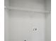 Laundry room has wire shelving and utility connections at 7004 Panda Ln, Austell, GA 30168