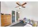 A bright room featuring wood dresser and plenty of space for storage and play at 2374 Buchanan Hwy, Dallas, GA 30157