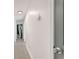 Bright hallway featuring modern finishes and recessed lighting, with a glimpse into other rooms at 2374 Buchanan Hwy, Dallas, GA 30157