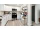 Modern kitchen featuring stainless steel appliances, granite countertops, and ample storage space at 2374 Buchanan Hwy, Dallas, GA 30157