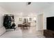 Open living space features sleek flooring, a dining area, modern furnishings and bright natural light at 2374 Buchanan Hwy, Dallas, GA 30157