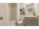 Functional bathroom featuring a shower-tub combo, neutral colors, and a single sink vanity at 3058 Yellowhammer Dr, Marietta, GA 30064