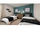 Shared bedroom featuring two twin beds, an accent wall, and plenty of space for siblings at 3058 Yellowhammer Dr, Marietta, GA 30064