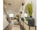 Bright entryway featuring hardwood floors, stylish decor, and an open view to the living room at 3058 Yellowhammer Dr, Marietta, GA 30064