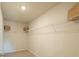 Spacious walk-in closet with ample shelving for organized storage and easy access at 3058 Yellowhammer Dr, Marietta, GA 30064