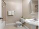 This bathroom features a toilet, vanity, and shower-tub combo at 4126 Gold Mill Rdg, Canton, GA 30114
