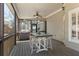 Covered porch featuring a fan, and an outdoor table set, perfect for entertaining at 4126 Gold Mill Rdg, Canton, GA 30114
