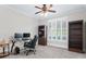 A home office with a work station, bookshelves, and natural light from the window at 4126 Gold Mill Rdg, Canton, GA 30114