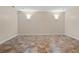 Empty room is equipped with tile flooring and neutral walls and trim at 4126 Gold Mill Rdg, Canton, GA 30114