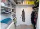 Walk in closet with shelving for clothes and accessories at 5400 Roswell Rd # K2, Atlanta, GA 30342