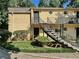 Charming apartment building with staircases, well-maintained landscaping and exterior lighting at 5400 Roswell Rd # K2, Atlanta, GA 30342
